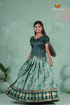 Elegant Green Embroidery Pattu Pavadai for Girls – Traditional Silk Outfit