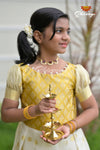 Yellow Onam Golden Butta Long Gown Design for Girls