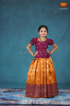 Girls Mustard Yellow Peacock Circle Pattu Pavadai Designs