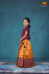 Girls Mustard Yellow Peacock Circle Pattu Pavadai Designs